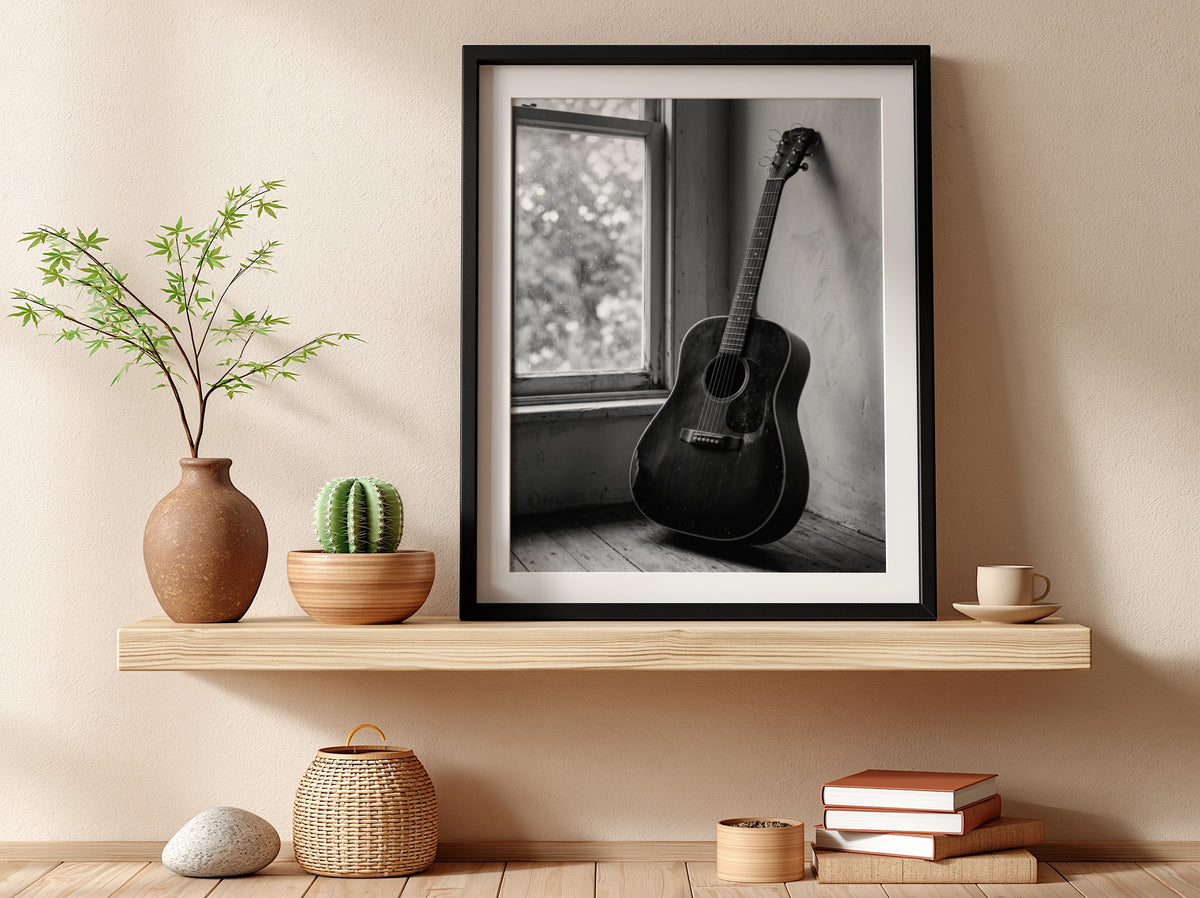 black and white acoustic guitar wall art with vintage rustic interior and soft natural window light