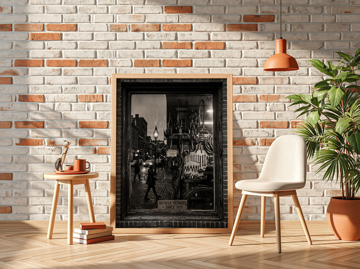 Black and white bicycle repairs shop poster with vintage bicycles and tools seen through window
