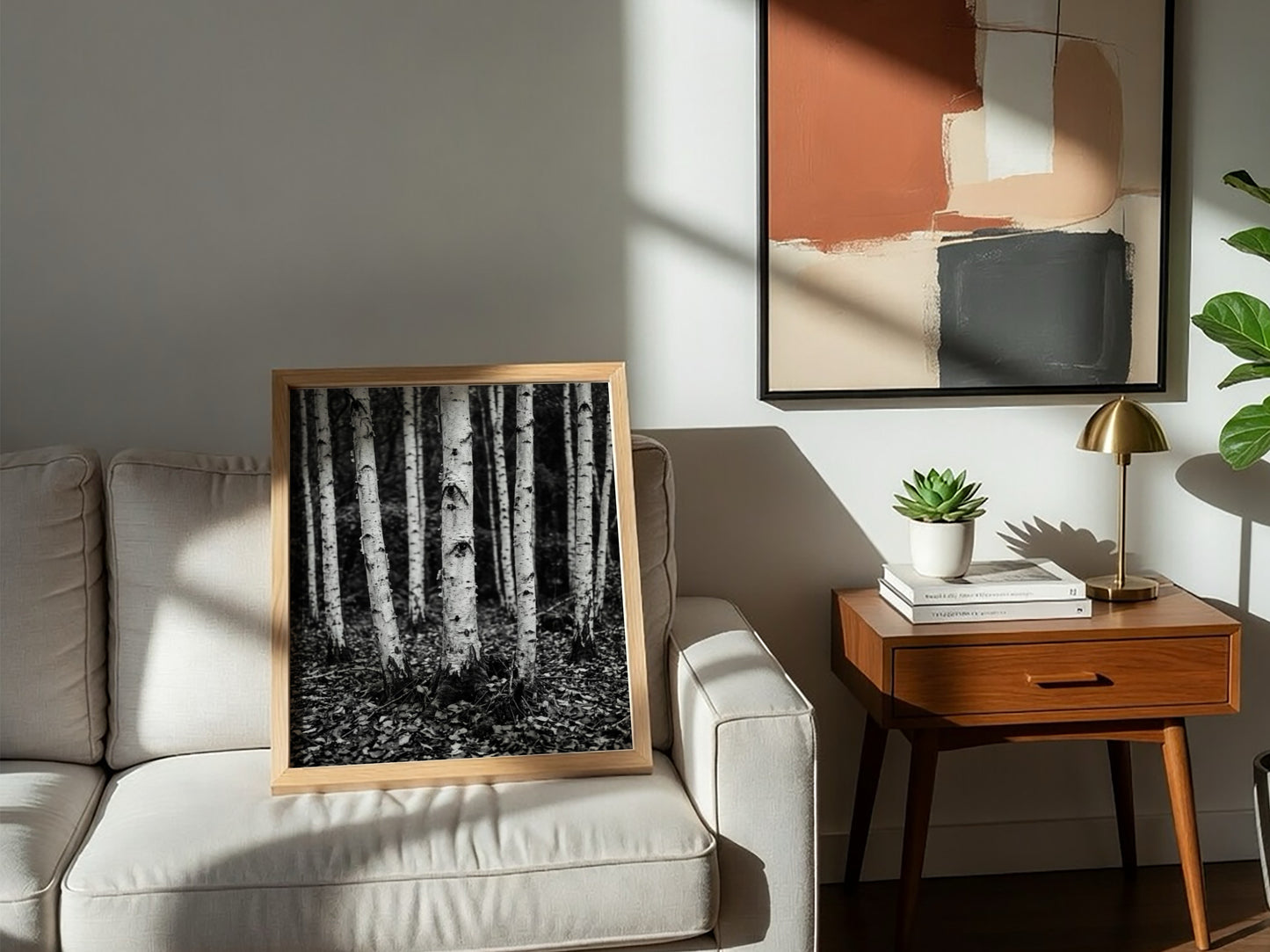 Black and white poster of birch trees with textured bark and fallen leaves forest floor