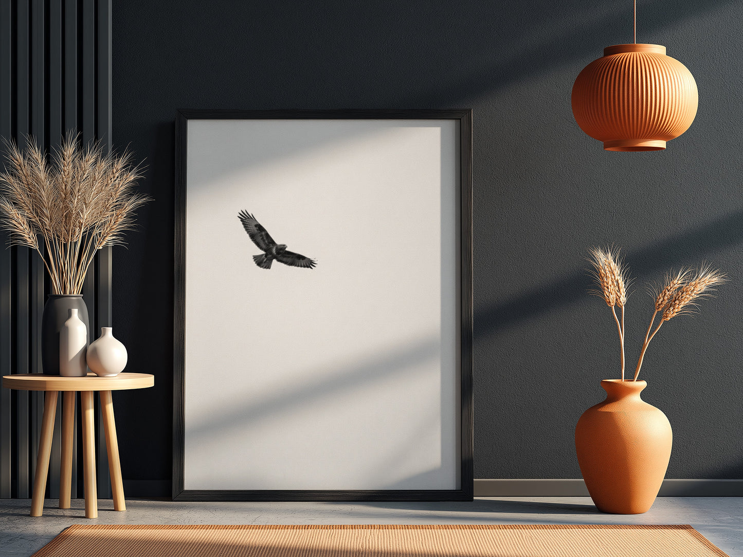 Framed wall decor featuring a black bird in flight against a pale sky with natural wood frame