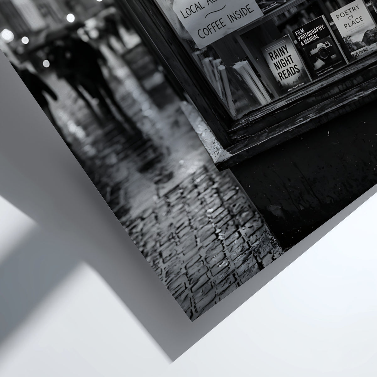 Black and white photographic wall decor showing a rainy evening bookshop window with books and reflections