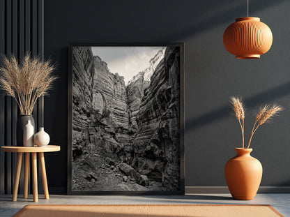 Black and white poster of canyon walls with layered sedimentary rock and rugged textures
