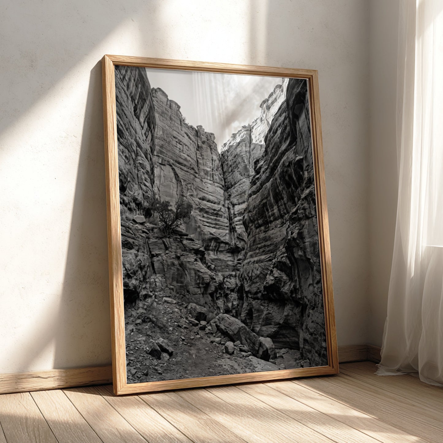 Black and white poster of canyon walls with layered sedimentary rock and rugged textures