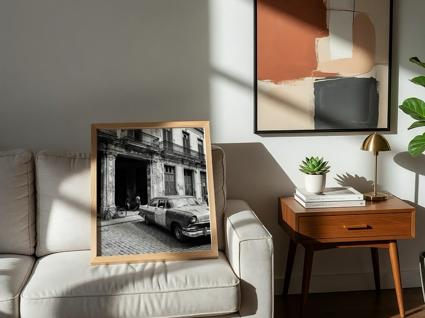 Black and white poster of vintage car parked on Havana street with colonial building and cobblestones
