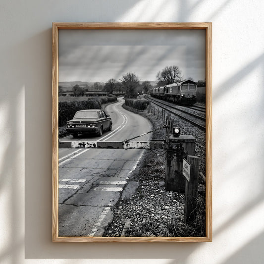 Vintage wall decor black and white photo of car waiting at level crossing and passing train