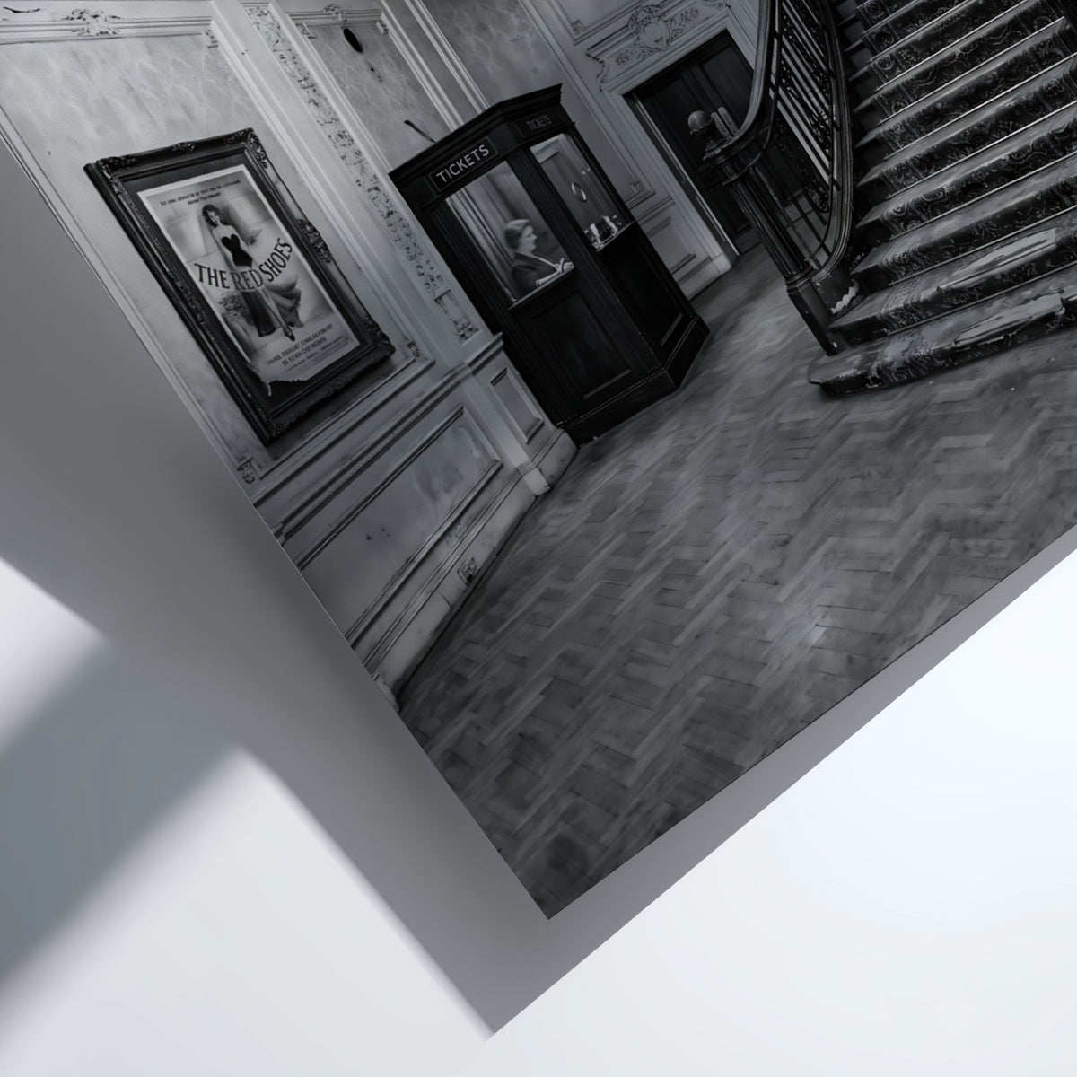 Black and white cinema lobby poster with sweeping staircase and chandelier in vintage style