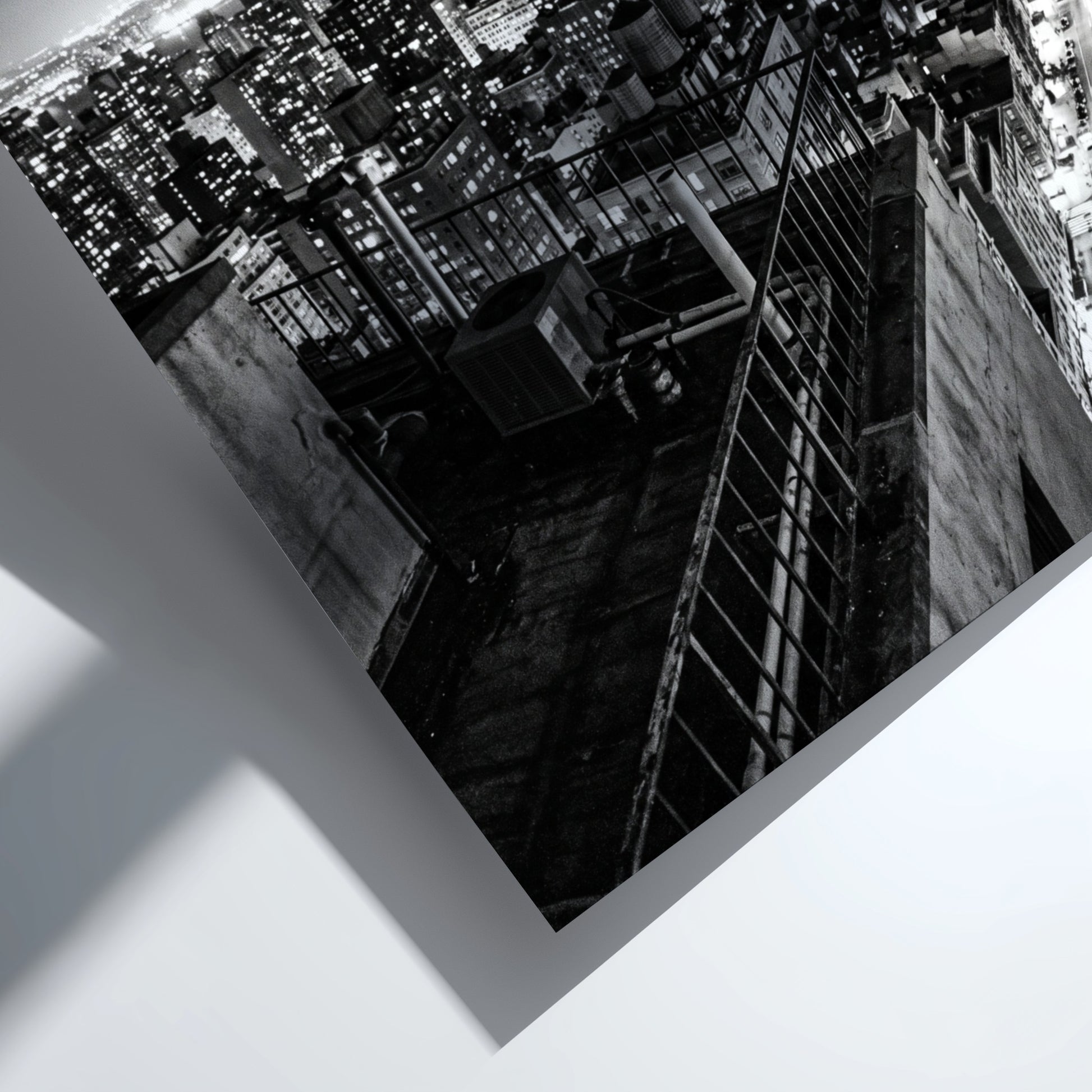 City skyline at night poster in black and white with glowing lights and tall buildings