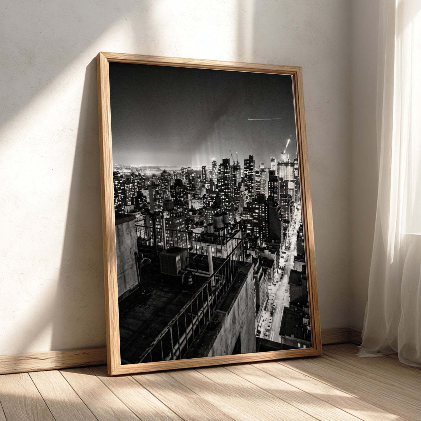 City skyline at night poster in black and white with glowing lights and tall buildings