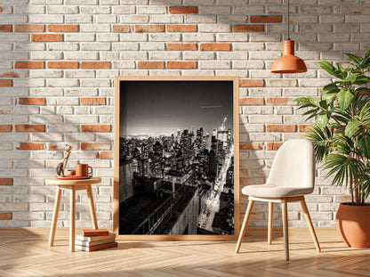 City skyline at night poster in black and white with glowing lights and tall buildings