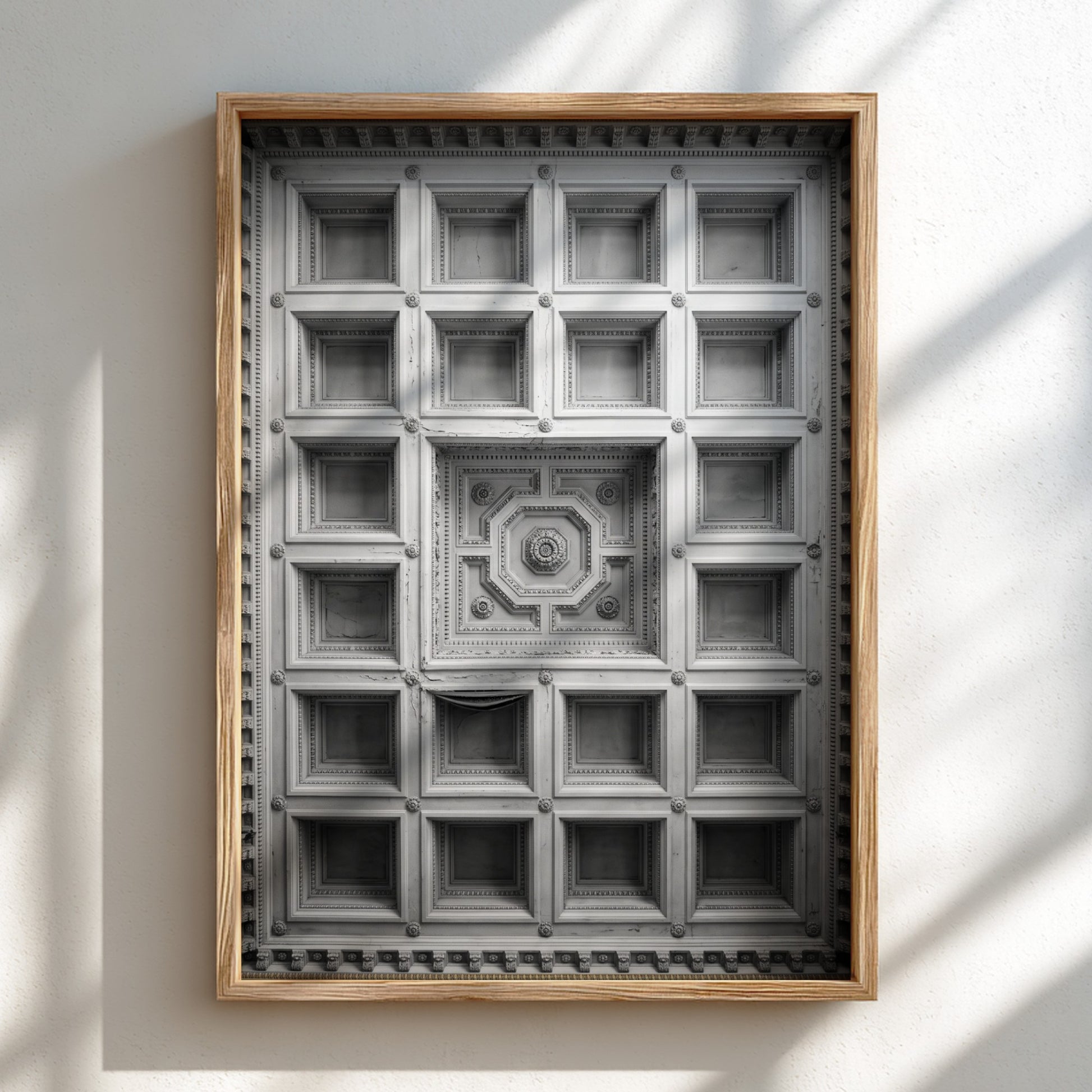 Framed architectural poster showing black and white coffered ceiling with geometric patterns and ornate