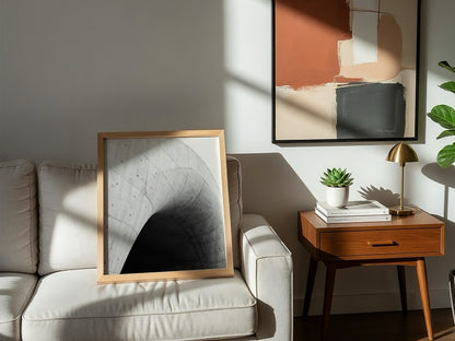 Concrete ramp wall decor with curving smooth grey concrete and dark shadow, minimalist architectural style