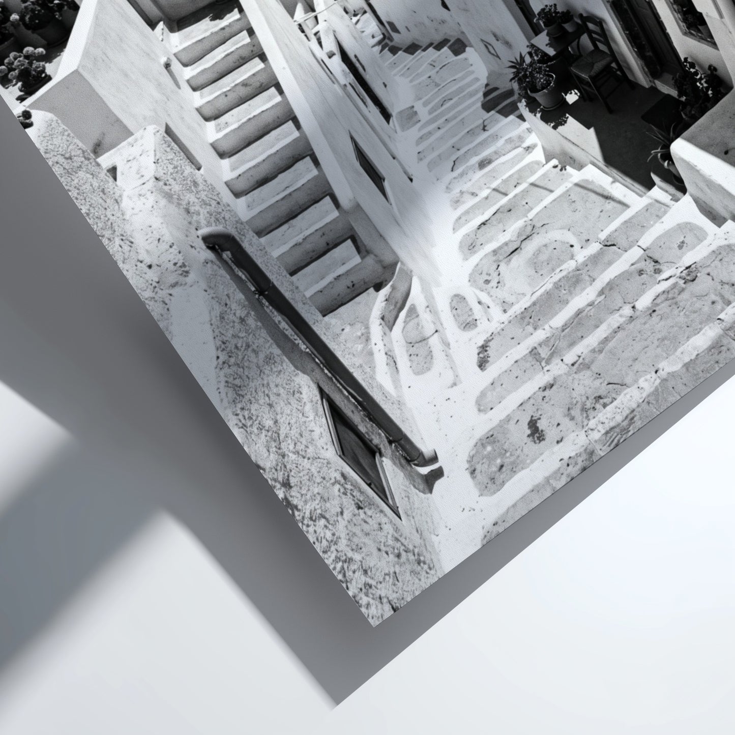 Framed black and white Cycladic steps winding between whitewashed buildings Mediterranean wall decor