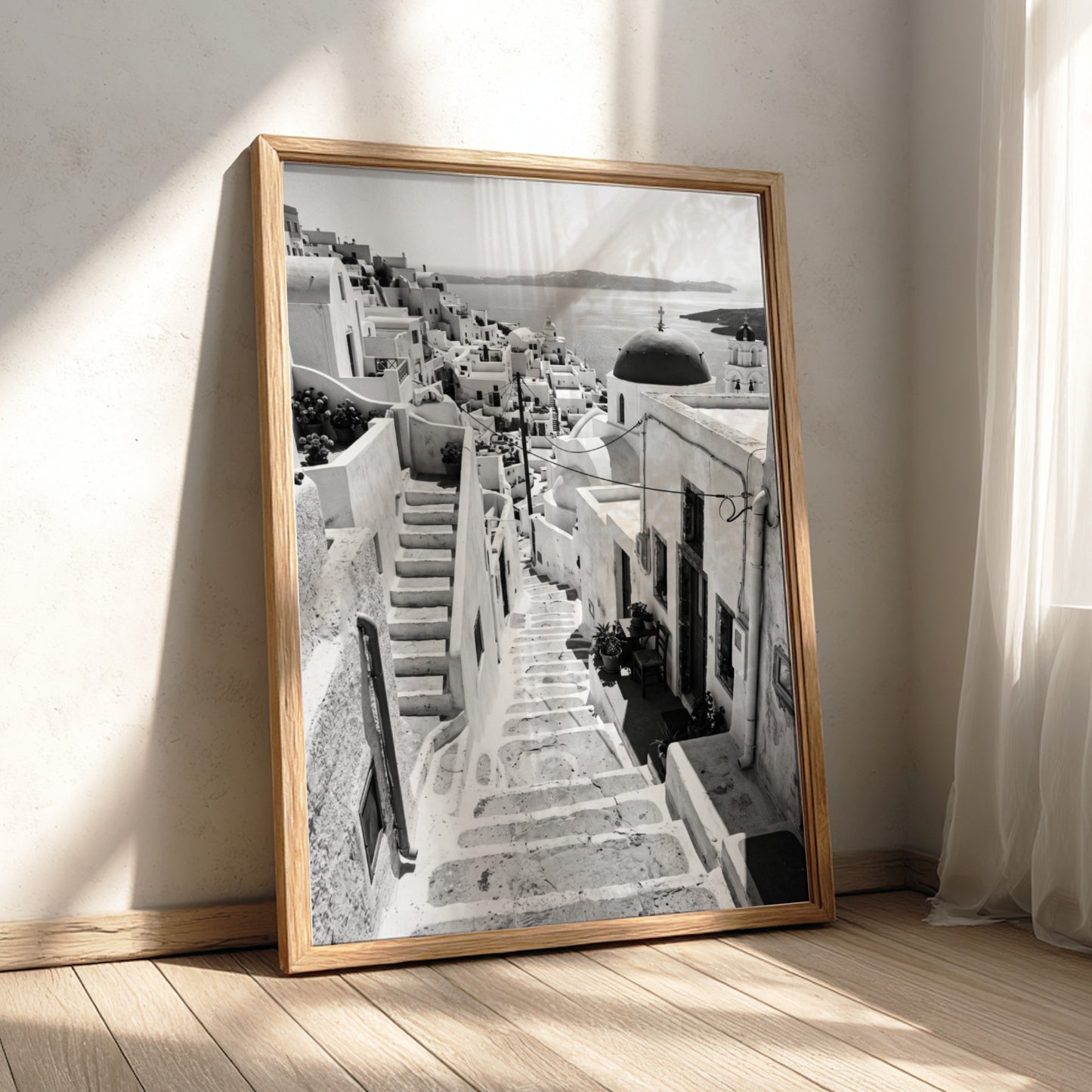 Framed black and white Cycladic steps winding between whitewashed buildings Mediterranean wall decor
