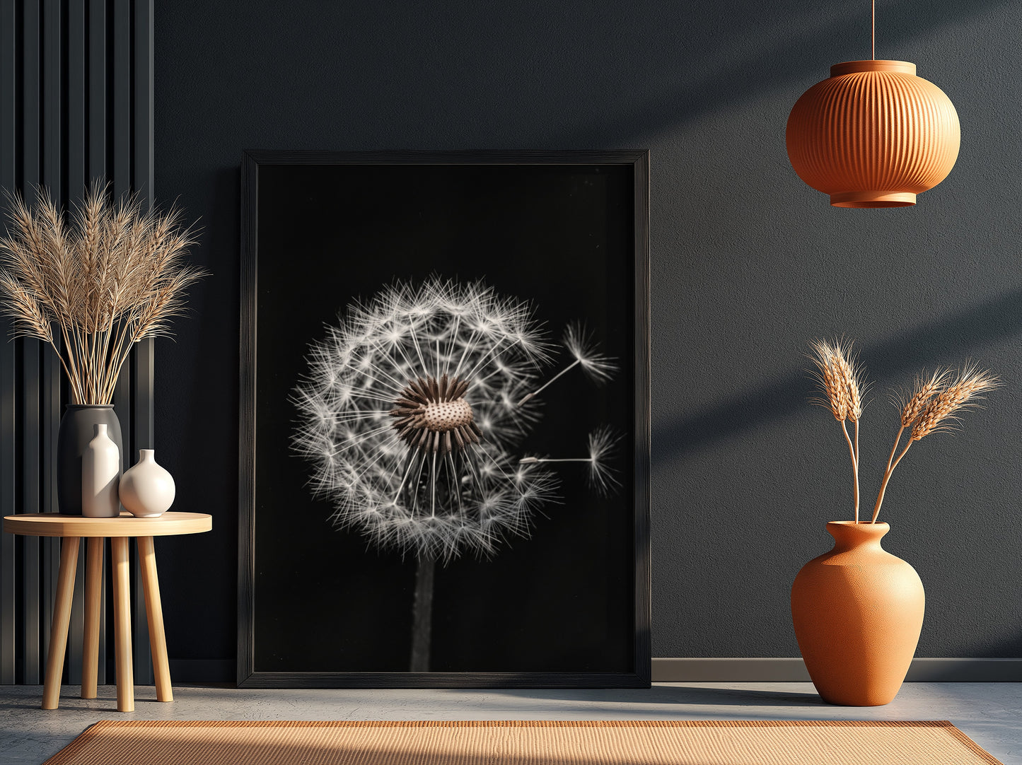Botanical wall art of a dandelion seed head with white seeds on black minimalist background