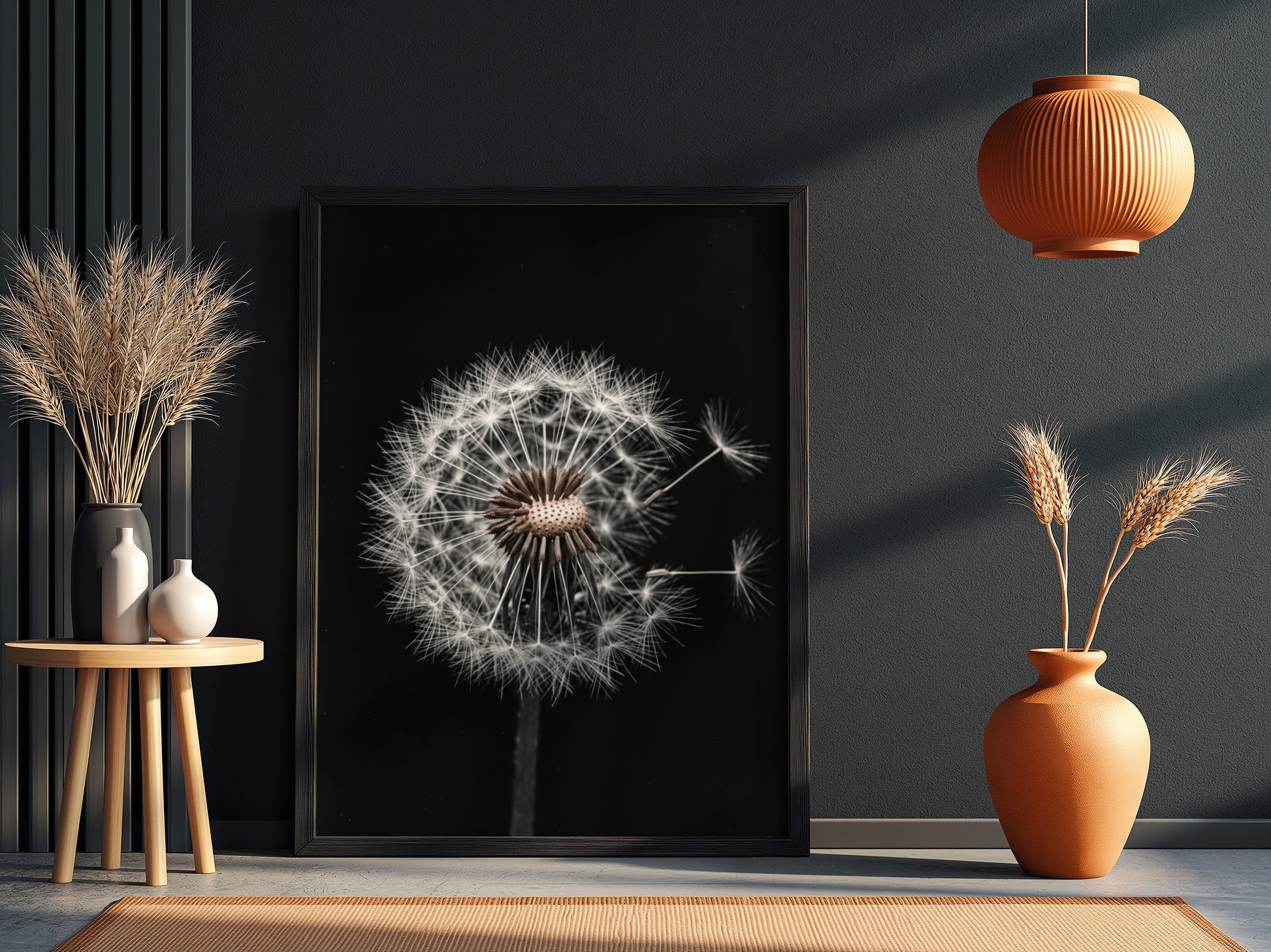 Botanical wall art of a dandelion seed head with white seeds on black minimalist background