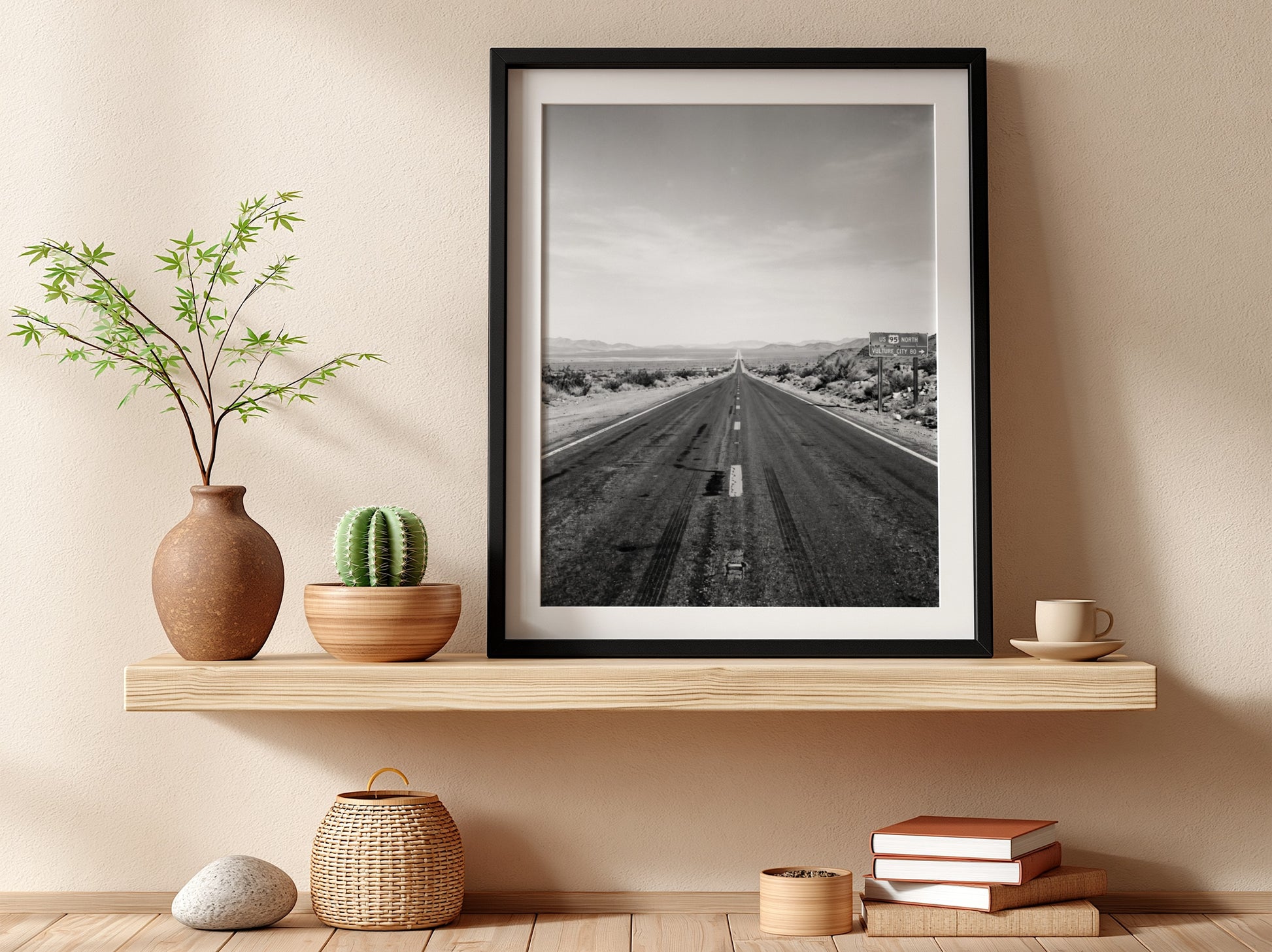 Wall poster of black and white desert highway stretching to horizon with mountains and open landscape