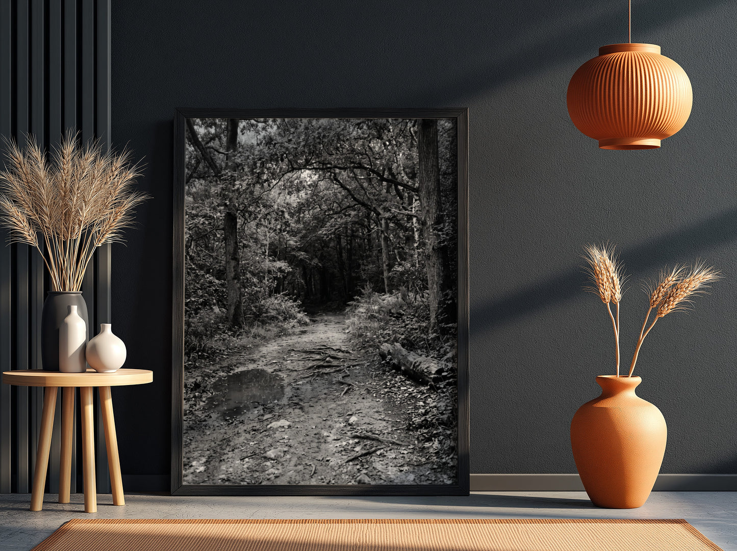 Black and white wall decor of dirt path through dense woodland with trees and roots