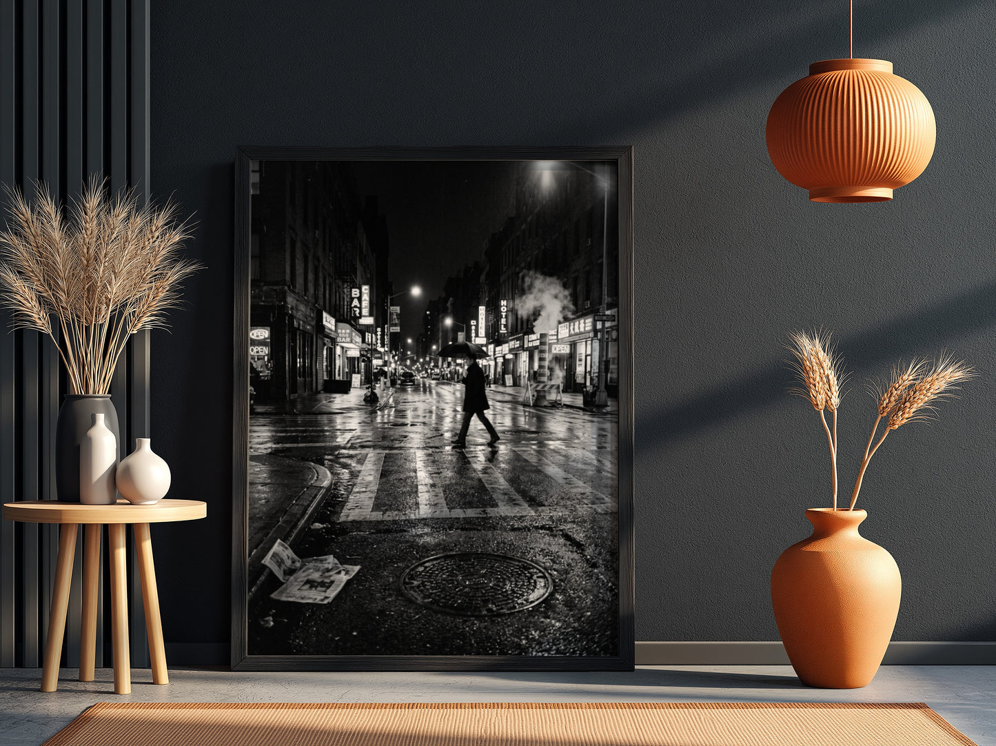 Black and white urban wall decor showing figure crossing wet street at night with reflective asphalt and