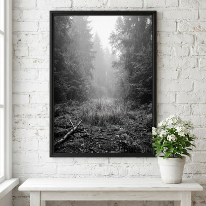 Poster showing a monochrome foggy forest clearing with dense trees and soft light