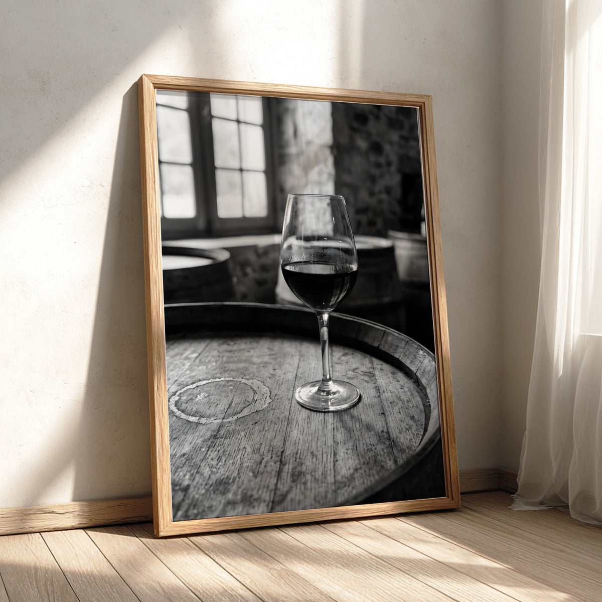 Black and white poster of a glass of wine on wooden barrel with window light shadows