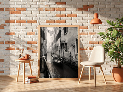Black and white poster of a gondola moored in a narrow Venetian canal with historic buildings and hanging