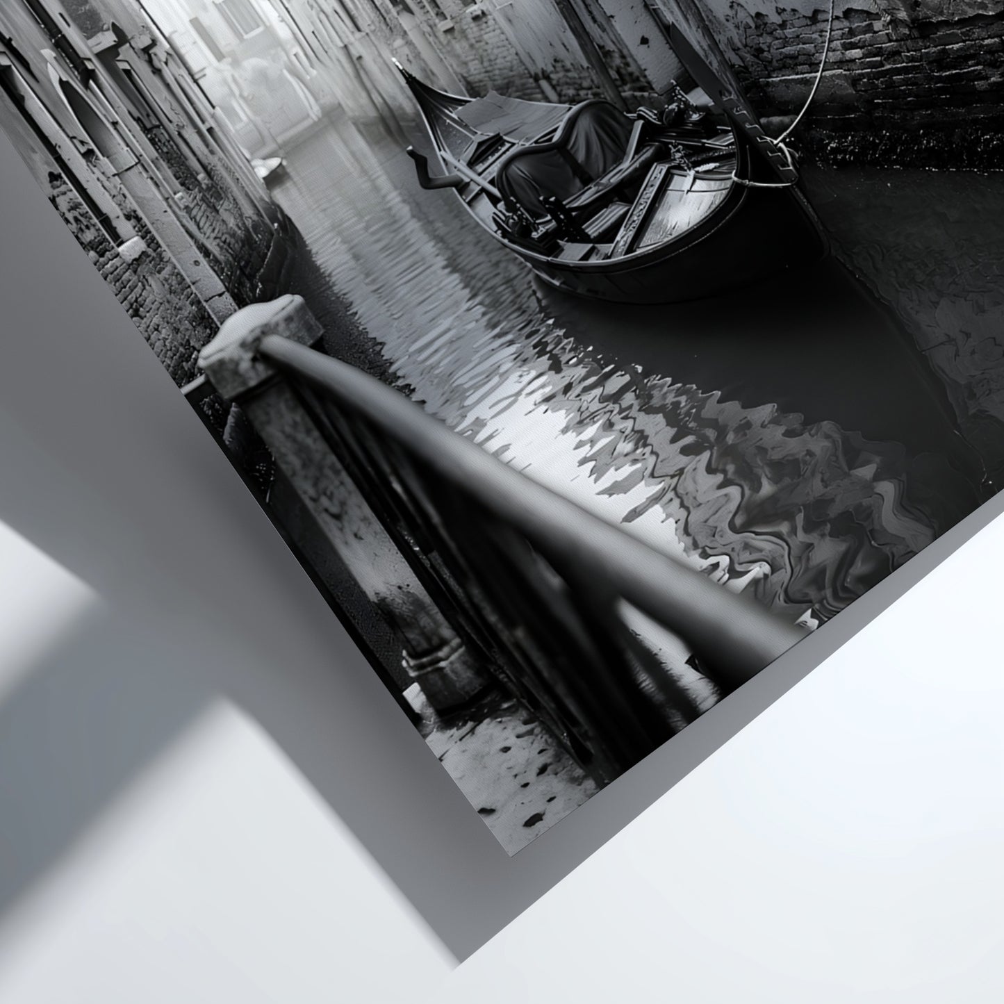 Black and white poster of a gondola moored in a narrow Venetian canal with historic buildings and hanging