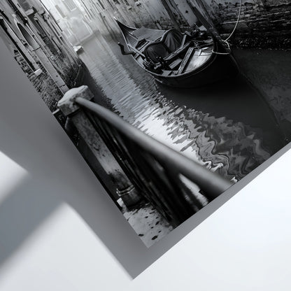 Black and white poster of a gondola moored in a narrow Venetian canal with historic buildings and hanging