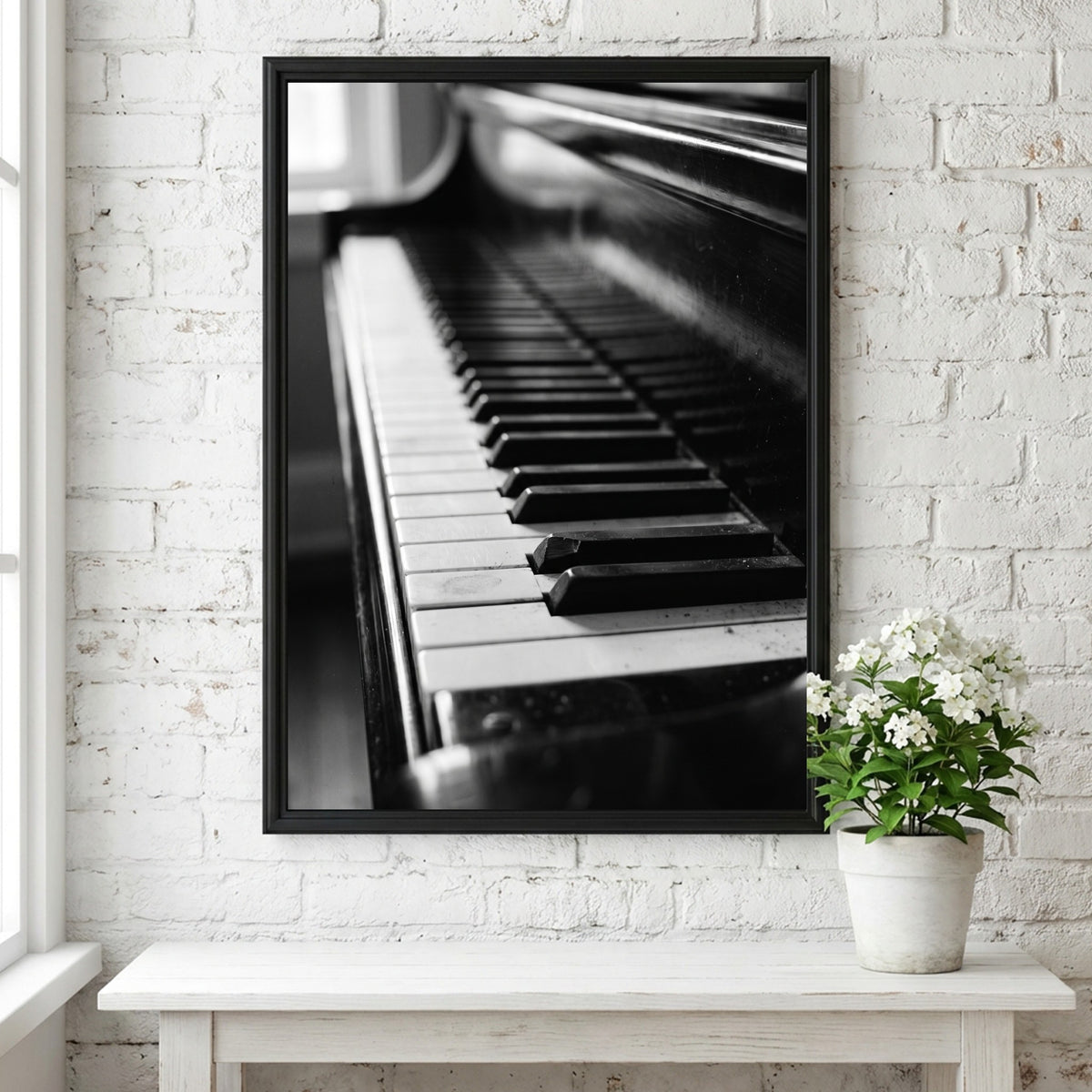 Wall decor showing close-up black and white grand piano keys with glossy finish and reflections