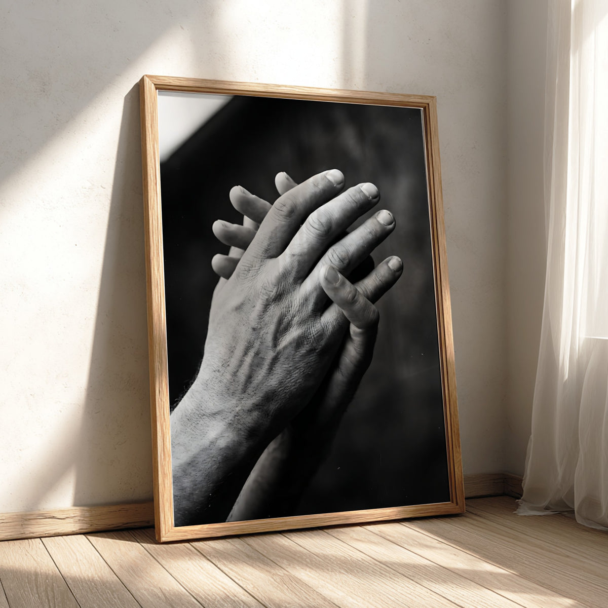 black and white poster featuring expressive hands in detailed monochrome style with textured skin and shadows