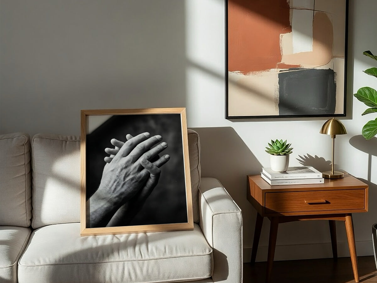 black and white poster featuring expressive hands in detailed monochrome style with textured skin and shadows