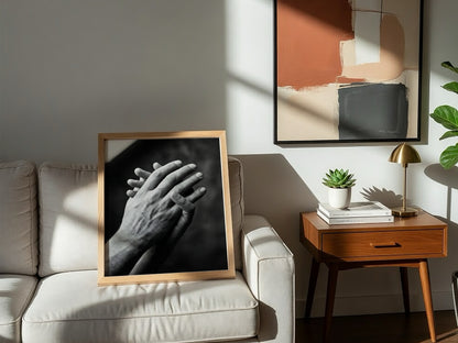 black and white poster featuring expressive hands in detailed monochrome style with textured skin and shadows
