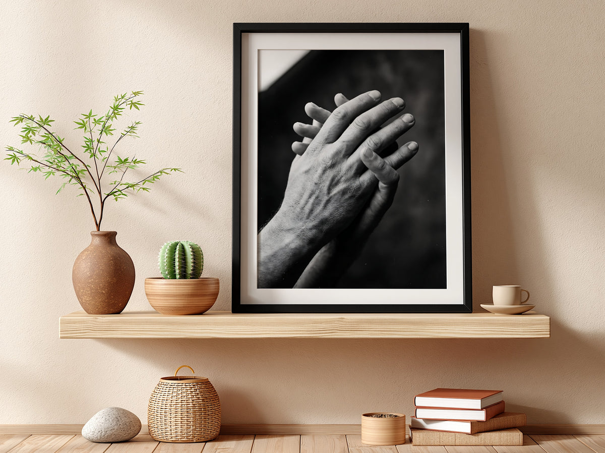 black and white poster featuring expressive hands in detailed monochrome style with textured skin and shadows