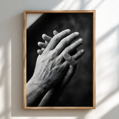 black and white poster featuring expressive hands in detailed monochrome style with textured skin and shadows