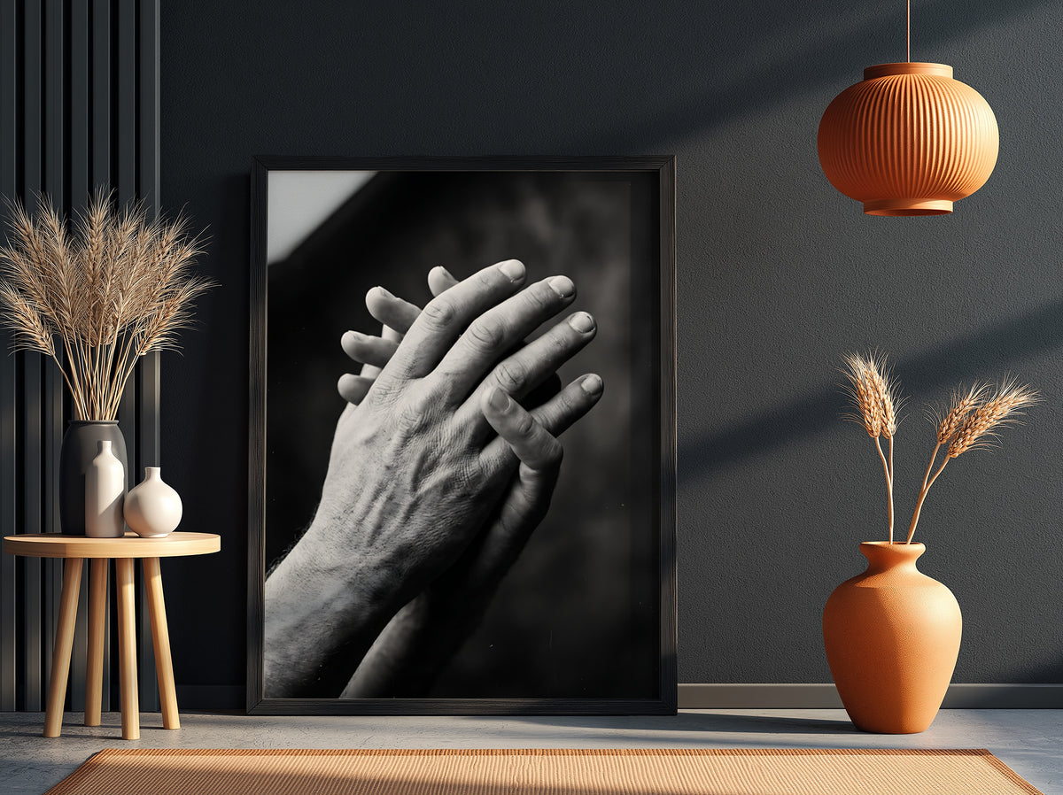 black and white poster featuring expressive hands in detailed monochrome style with textured skin and shadows