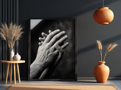 black and white poster featuring expressive hands in detailed monochrome style with textured skin and shadows