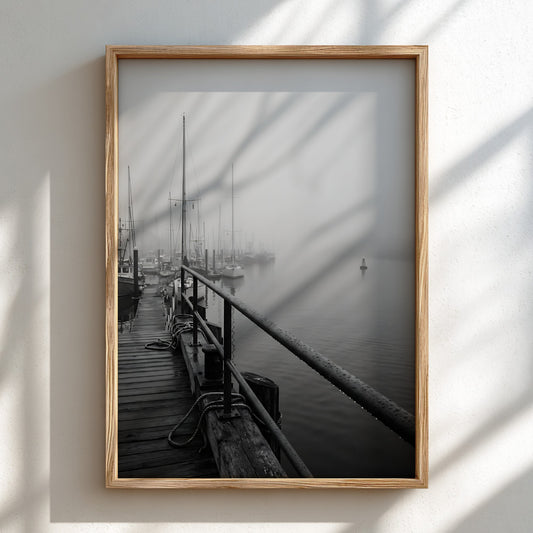 Harbor in morning fog poster with grayscale sailboats moored at wooden dock, soft misty waterfront scene