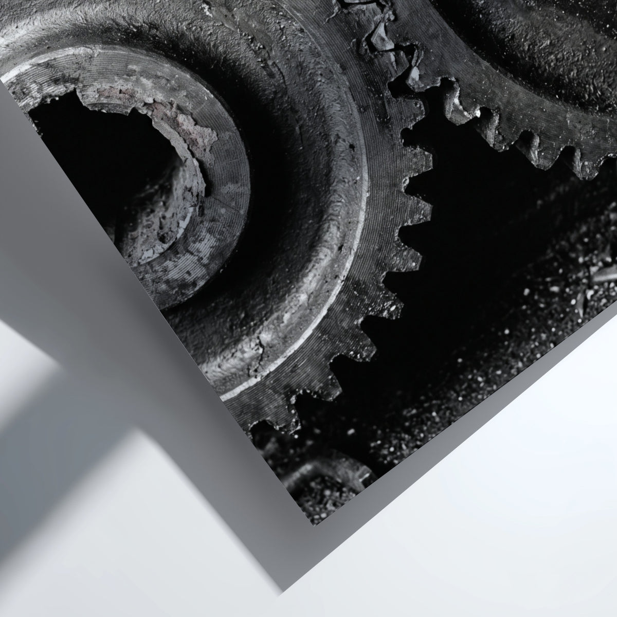 Poster of interlocking industrial gears in monochrome with detailed textured metal surfaces
