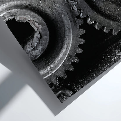 Poster of interlocking industrial gears in monochrome with detailed textured metal surfaces