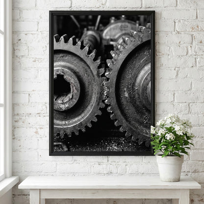 Poster of interlocking industrial gears in monochrome with detailed textured metal surfaces
