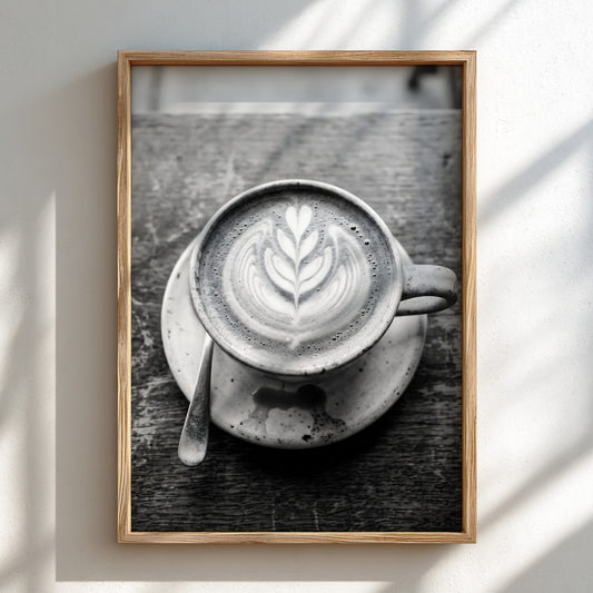 Poster of latte art in ceramic cup with spoon on saucer, monochrome rustic style