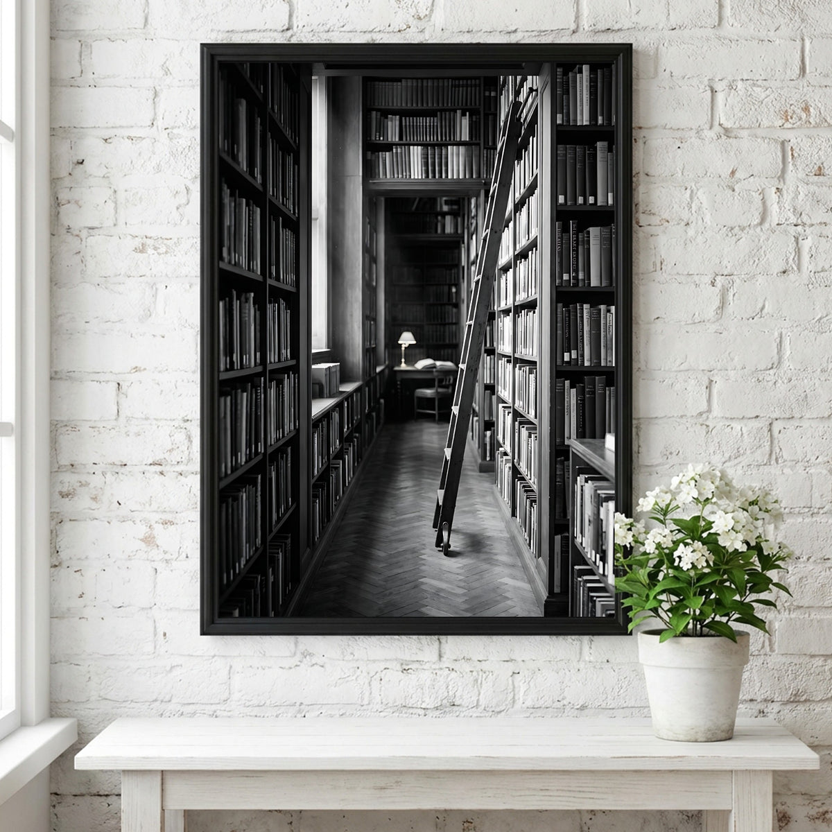 Wall decor featuring black and white photograph of library aisle with ladder and glowing reading lamp
