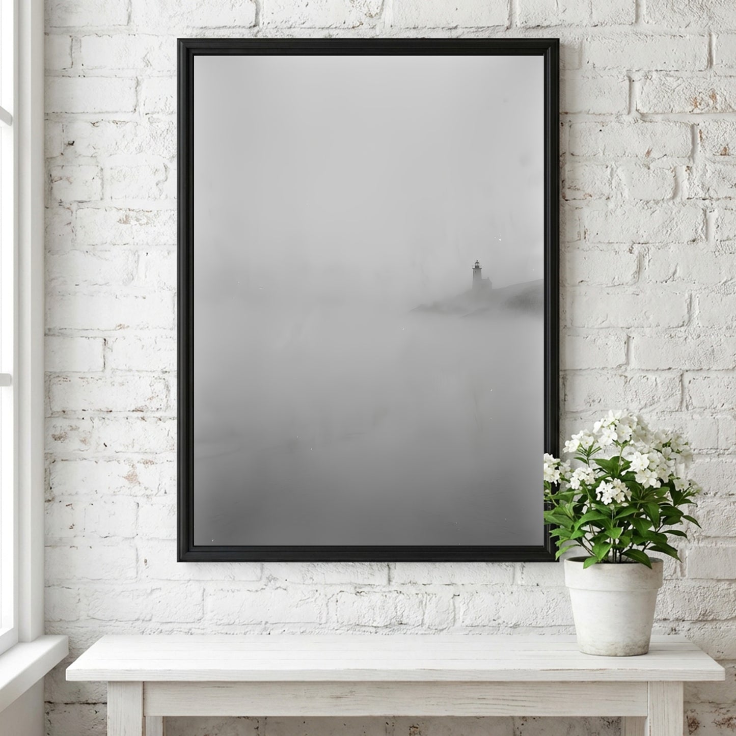 Poster featuring lighthouse emerging from fog in muted grayscale tones with soft shadows
