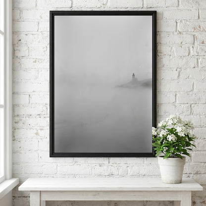 Poster featuring lighthouse emerging from fog in muted grayscale tones with soft shadows