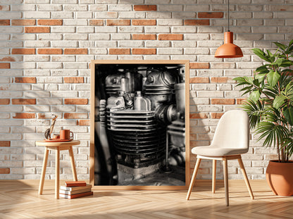 Wall decor featuring black and white close-up photo of motorcycle engine cylinder with metal textures