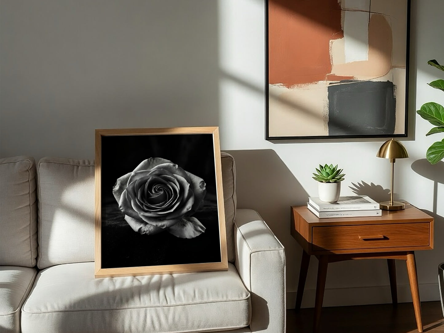 Monochrome wall decor featuring a detailed open rose on black velvet background with soft petal textures
