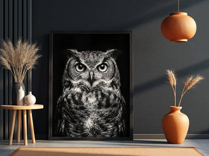 black and white owl portrait poster with detailed feathers and piercing eyes on dark background