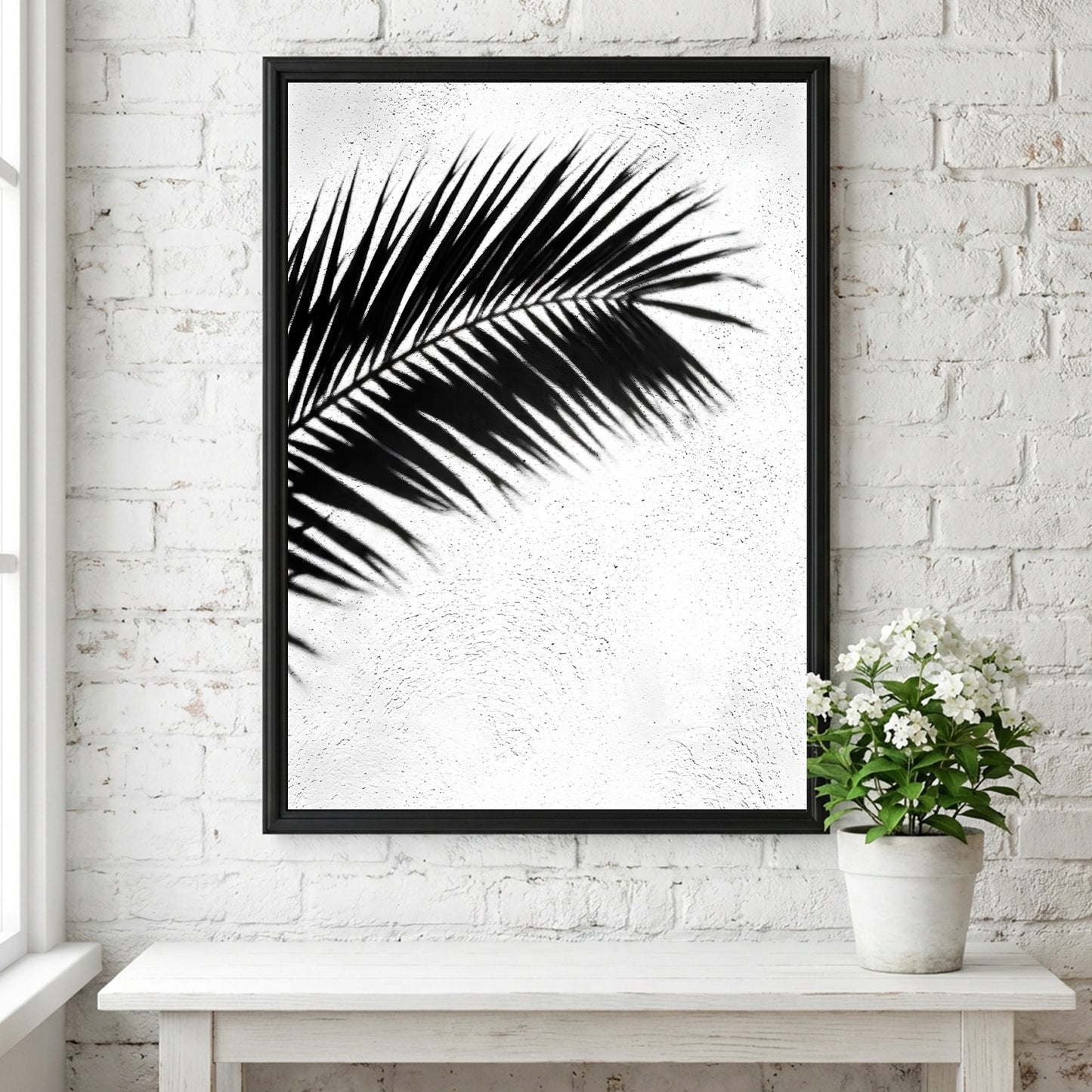 Wall decor poster with black palm frond shadows on white stucco textured background in minimalist style