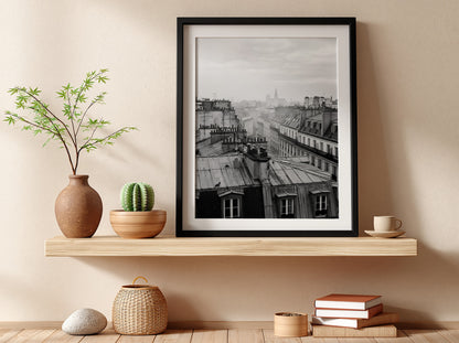poster showing monochrome Parisian rooftops at dawn with soft light and misty skyline
