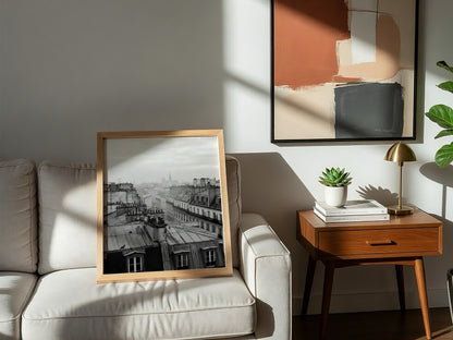 poster showing monochrome Parisian rooftops at dawn with soft light and misty skyline