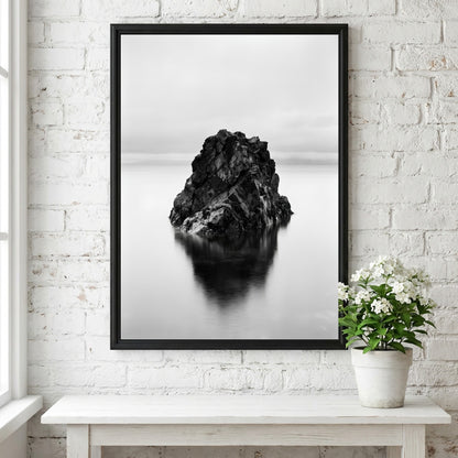 minimalist wall decor of rock formation in still water black and white photography